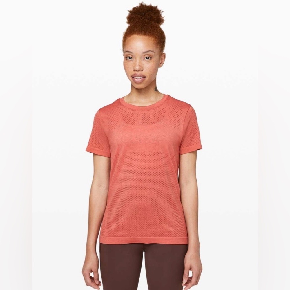 NWT Lululemon Breeze By Short Sleeve *lululemon
Rustic Coral  size 8